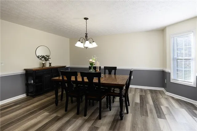 a bathroom with a double vanity sink and mirror