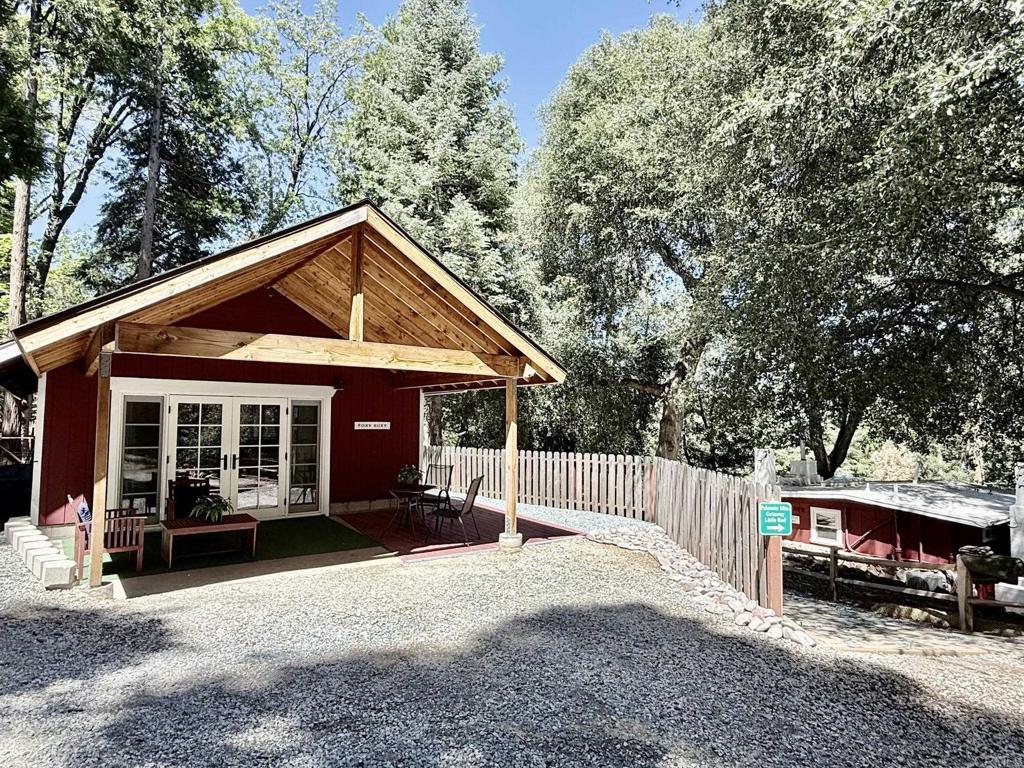 22292 Crestline Road Palomar Mountain, CA 92060 - Photo 18 of 38 a view of a house with a yard and wooden fence
