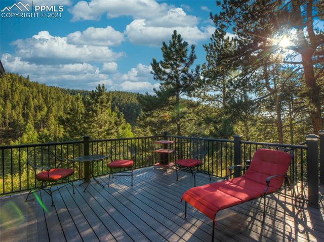 2033 Rampart Range Road Woodland Park, CO 80863 - Photo 4 of 9 Deck off back of home.