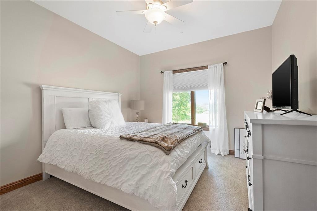 1860 Eastbrook Road New Castle, PA 16101 - Photo 16 of 25 a spacious bedroom with a bed and a flat screen tv