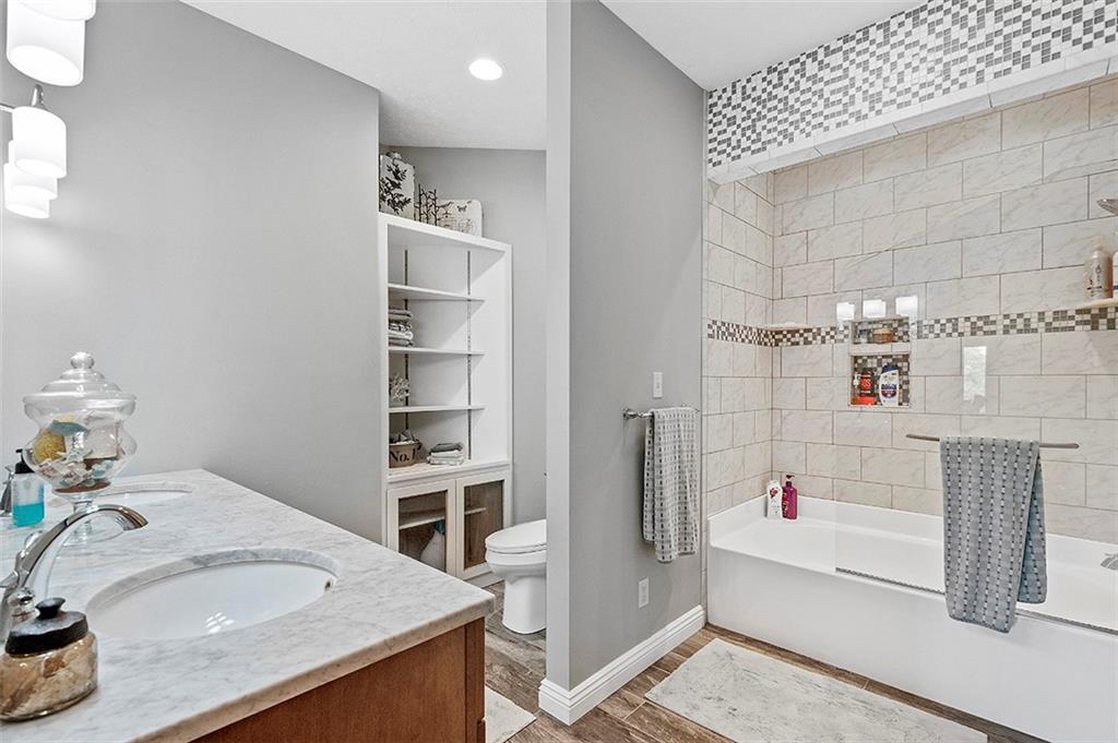 1860 Eastbrook Road New Castle, PA 16101 - Photo 17 of 25 a bathroom with a tub sink and shower