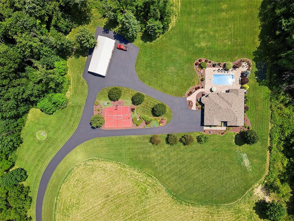 1860 Eastbrook Road New Castle, PA 16101 - Photo 3 of 25 an aerial view of a house with swimming pool and tennis court