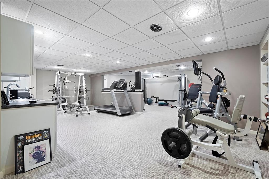 1860 Eastbrook Road New Castle, PA 16101 - Photo 22 of 25 a view of a room with gym equipment