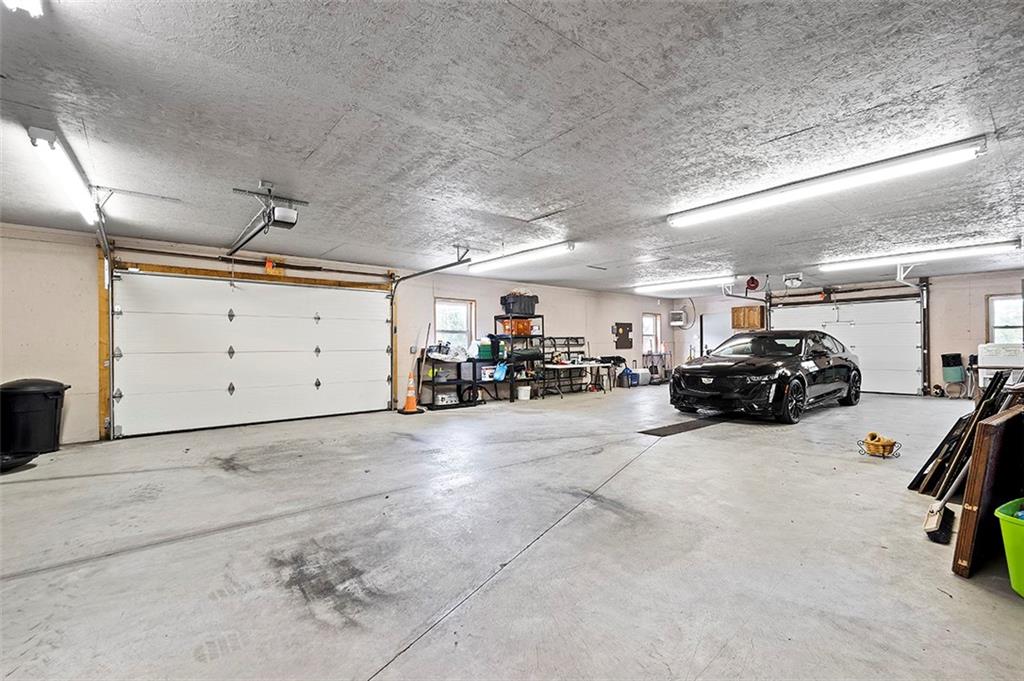 1860 Eastbrook Road New Castle, PA 16101 - Photo 24 of 25 a view of a garage with parked cars