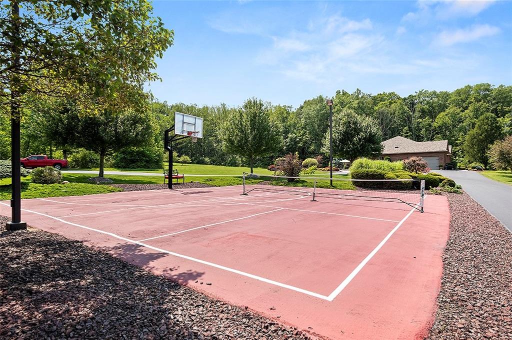 1860 Eastbrook Road New Castle, PA 16101 - Photo 25 of 25 a view of a tennis ground with large trees