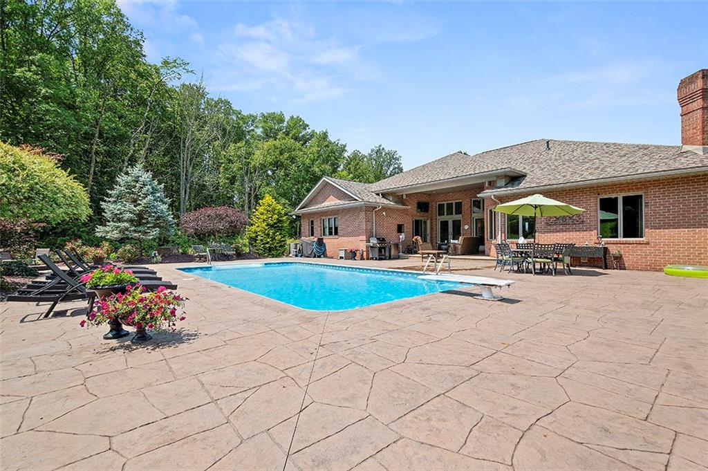 1860 Eastbrook Road New Castle, PA 16101 - Photo 7 of 25 a view of house with swimming pool and sitting area
