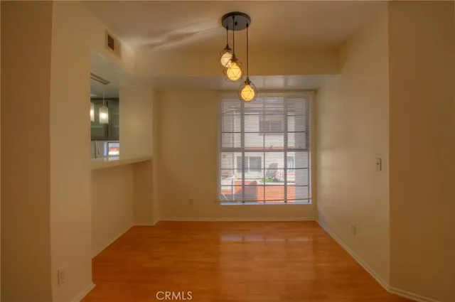 a view of a door and brick walls