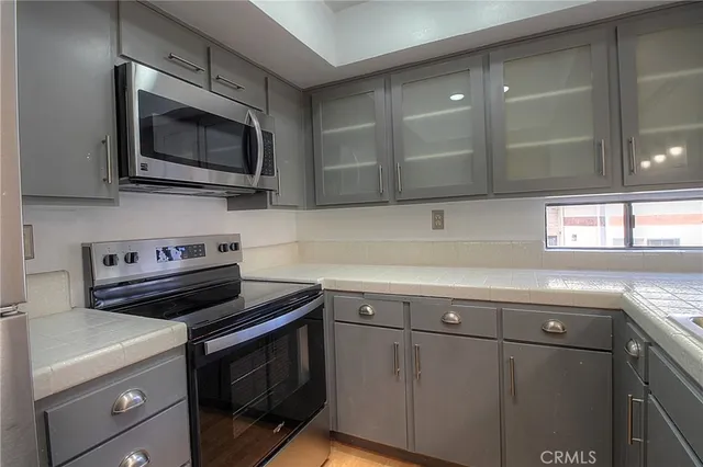 a bathroom with a toilet and shower