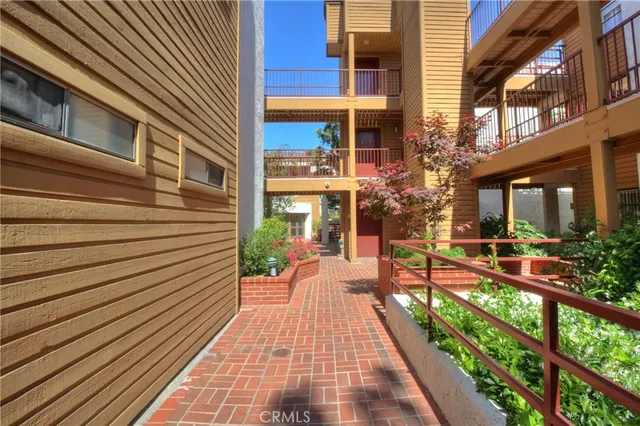 a aerial view of a house with a yard and garden