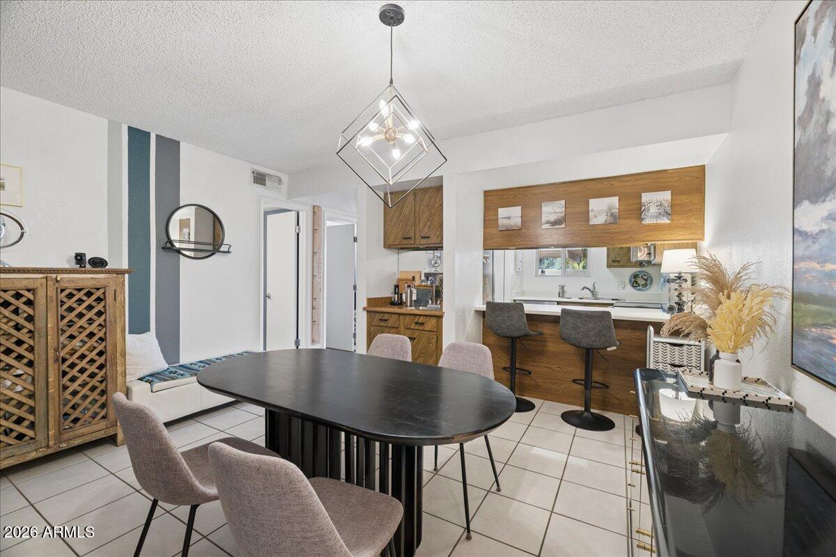 4150 East Cactus Road, Unit 120 Phoenix, AZ 85032 - Photo 11 of 42 11-Dining Area