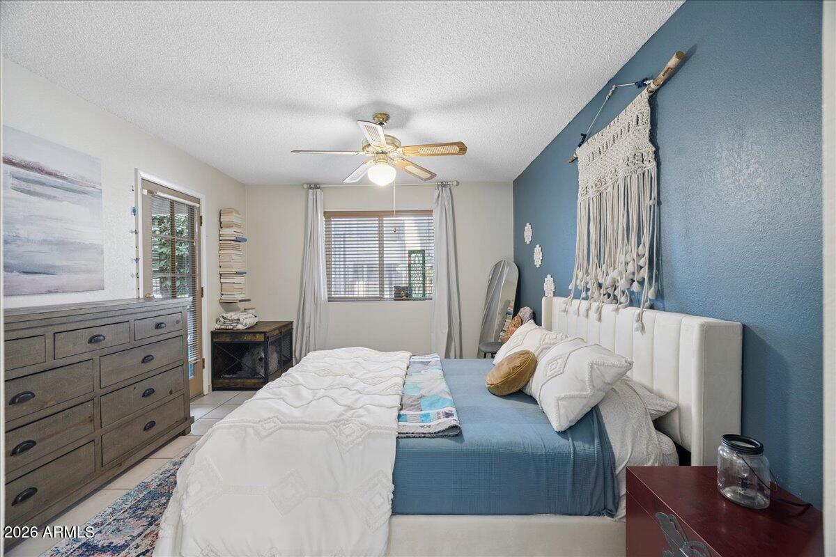 4150 East Cactus Road, Unit 120 Phoenix, AZ 85032 - Photo 20 of 42 20-Primary Bedroom w_Patio Access