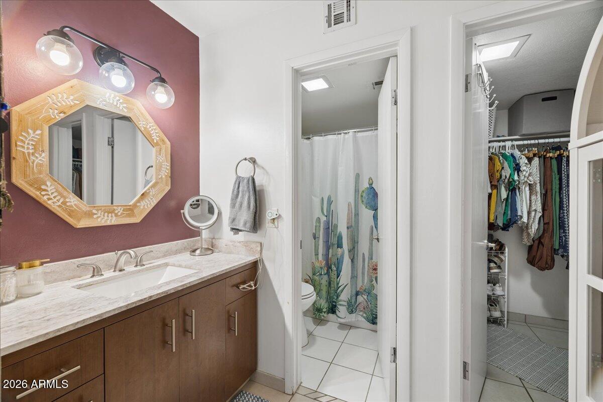 4150 East Cactus Road, Unit 120 Phoenix, AZ 85032 - Photo 21 of 42 21-Primary Bathroom & Walk-in Closet