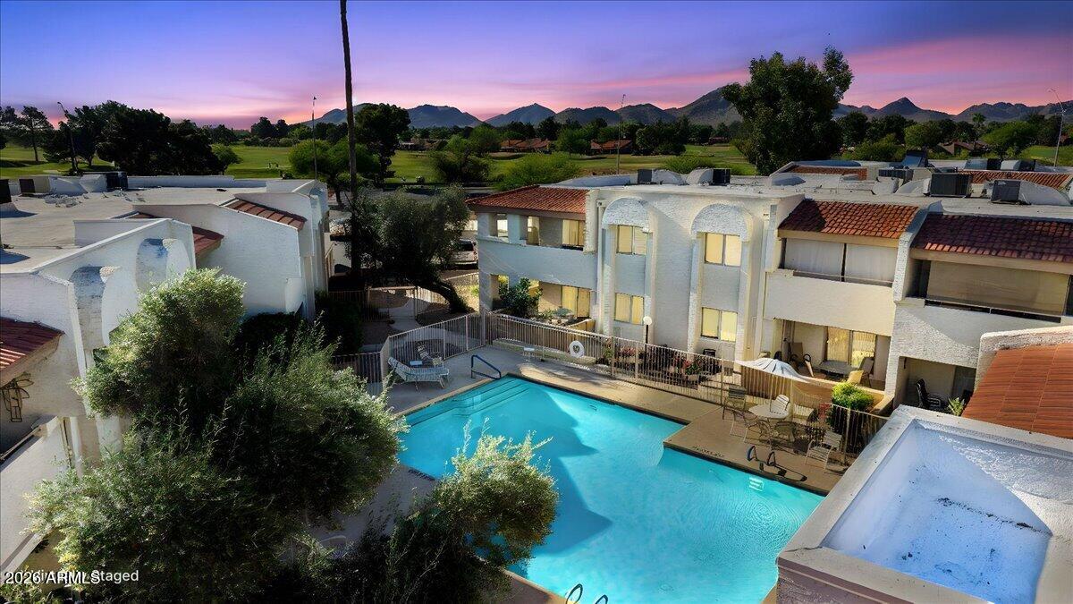 4150 East Cactus Road, Unit 120 Phoenix, AZ 85032 - Photo 41 of 42 41-Sunset at the Pool