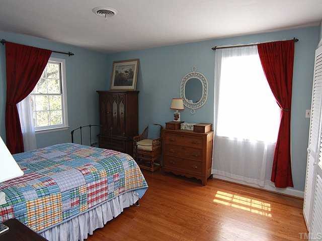3722 Eton Road Durham, NC 27707 - Photo 16 of 25 Light filled Master Bedroom with Dual His and Her closets that leads to the Renovated Master Bathroom