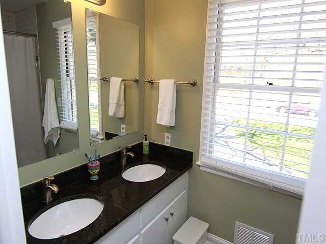 3722 Eton Road Durham, NC 27707 - Photo 20 of 25 2nd Bathroom with updates to include Subway Tile and Granite Countertop and Tile Floor.