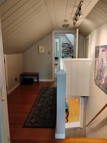 a bed room with a bed furniture and a window