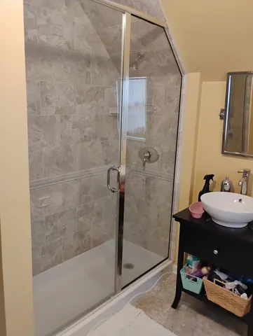 a bathroom with a sink and a mirror