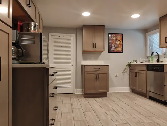 a kitchen with a cabinets and a stove