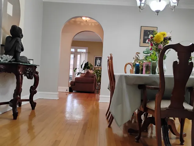 a view of a livingroom with furniture and a gym equipment