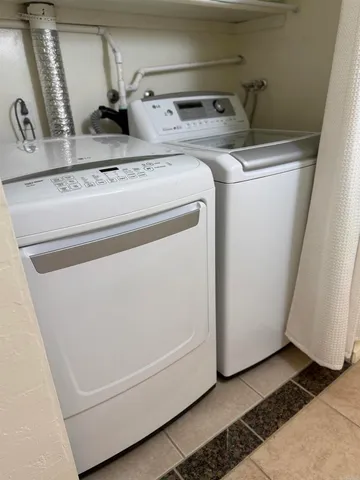 a bed room with a bed and a couch