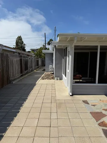 a view of a terrace with a garden
