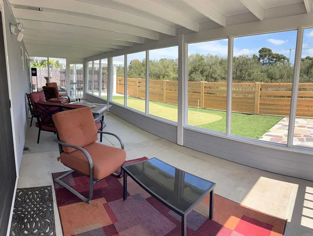 a view of a brick house with a street