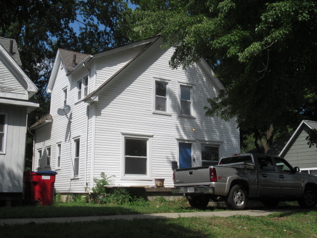 210 West Charles Street Champaign, IL 61820 - Photo 1 of 11 a view of a white house in the back yard