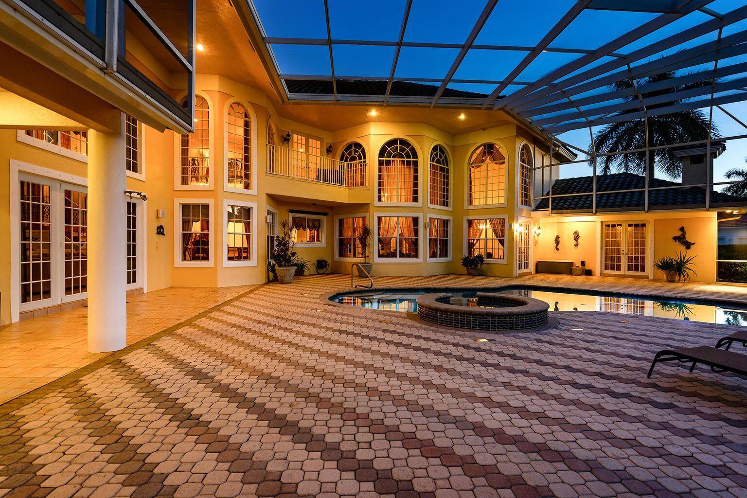 15535 Enstrom Road Wellington, FL 33414 - Photo 9 of 10 ENSTROM POOL INTERIOR EVENING