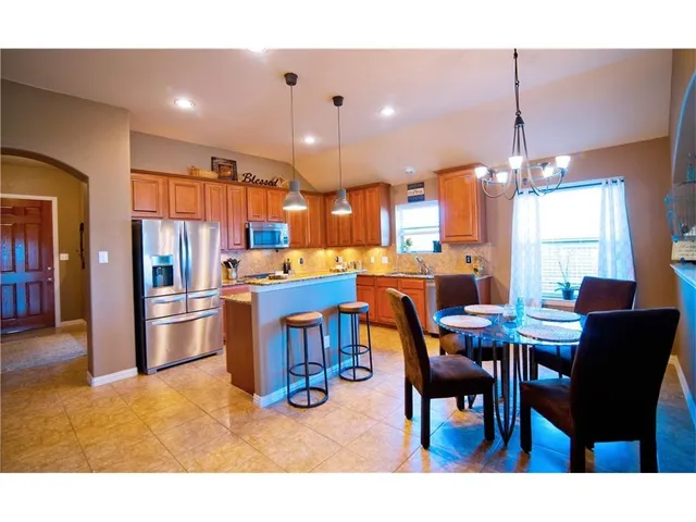 a view of a dining room with furniture