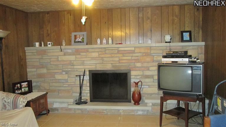 12400 West Sprague Road Cleveland, OH 44130 - Photo 12 of 25 Family room showing a whole wall of fireplace