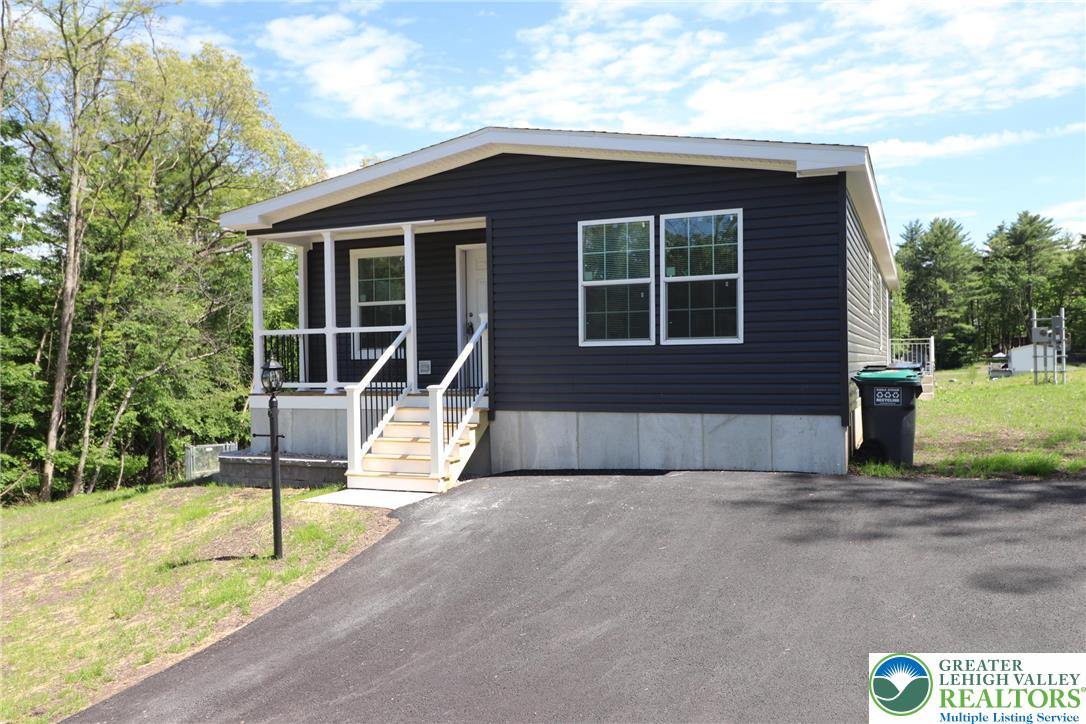 5020 Old Timber Road Stroudsburg, PA 18360 - Photo 29 of 32 a front view of a house with entertaining space