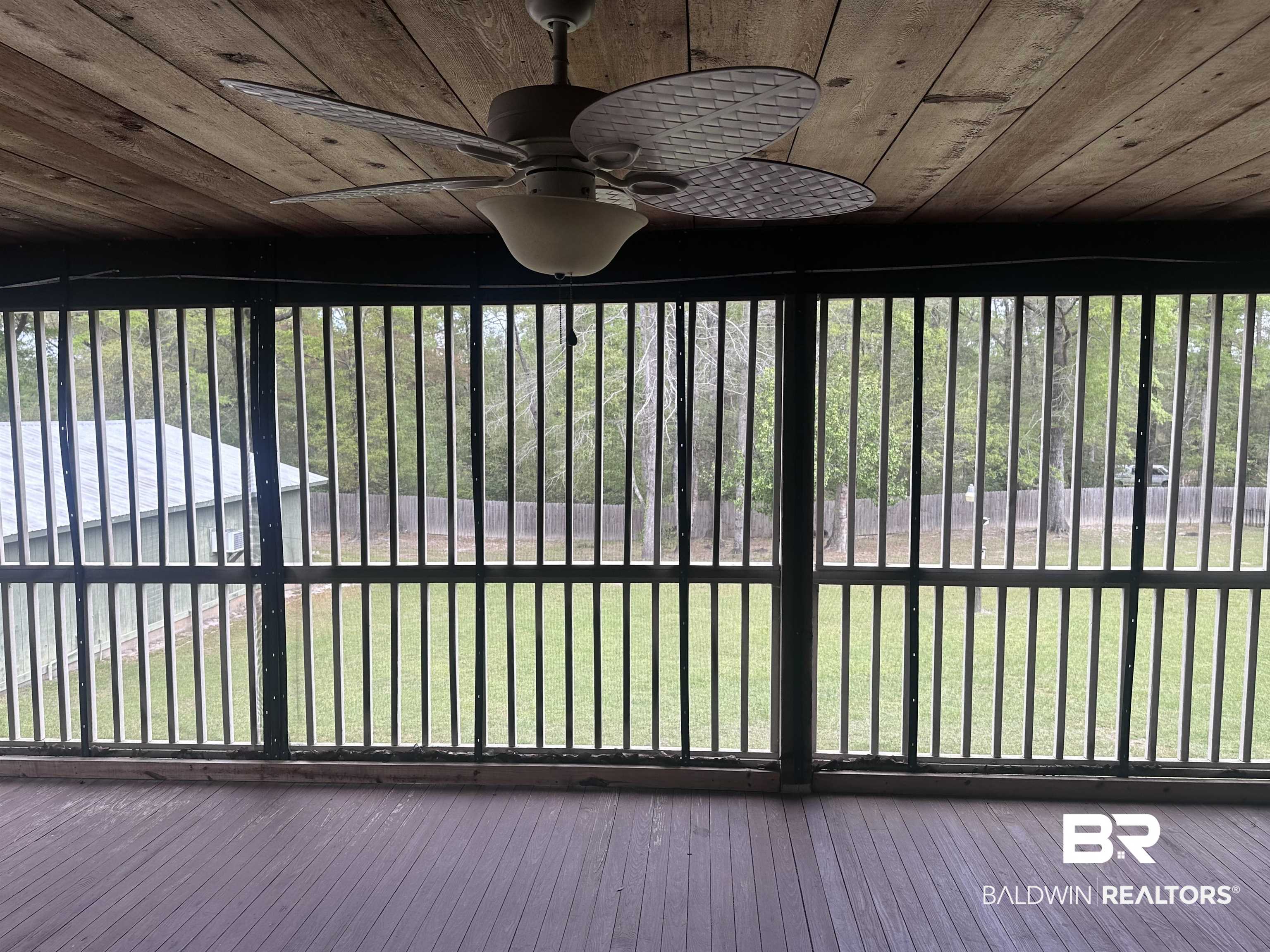 2785 Sowell Road Brewton, AL 36426 - Photo 19 of 24 Gate with ceiling fan and a yard