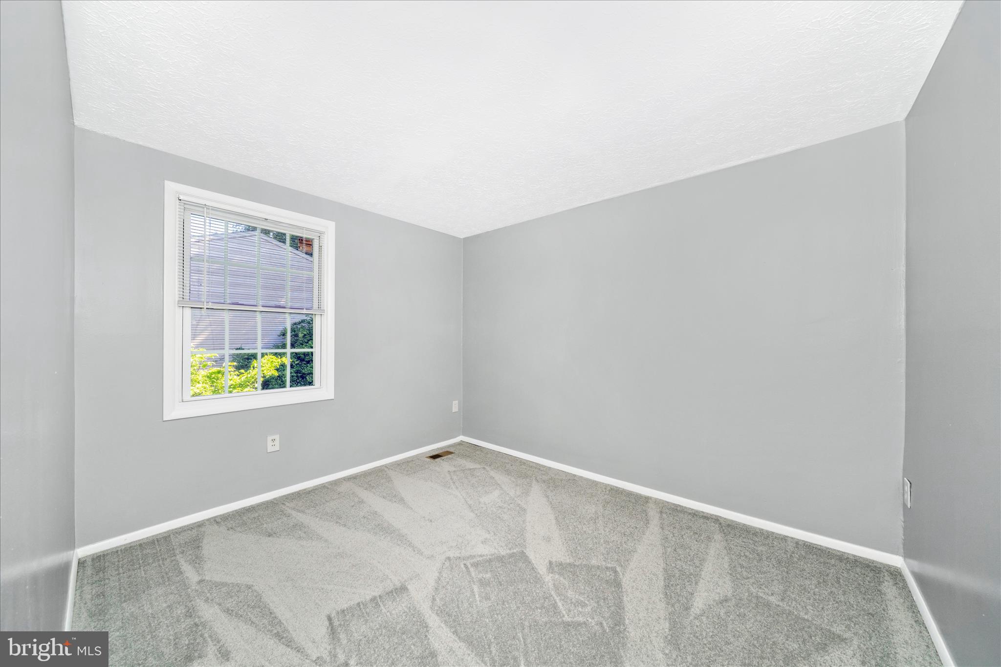 3749 Castle Terrace, Unit 12114 Silver Spring, MD 20904 - Photo 26 of 51 an empty room with windows