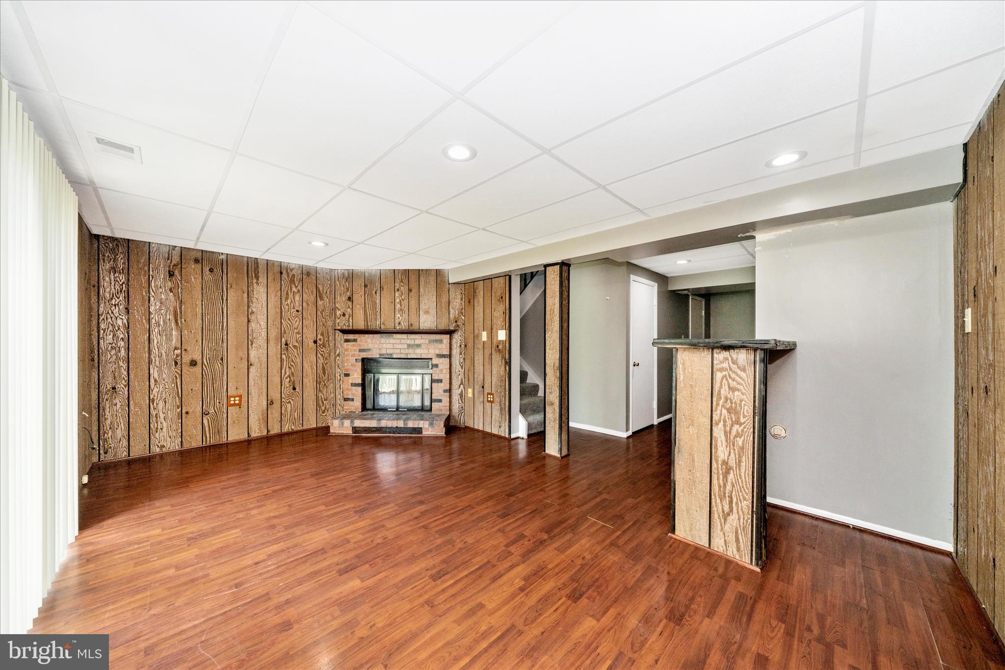 3749 Castle Terrace, Unit 12114 Silver Spring, MD 20904 - Photo 32 of 51 a view of an empty room with wooden floor