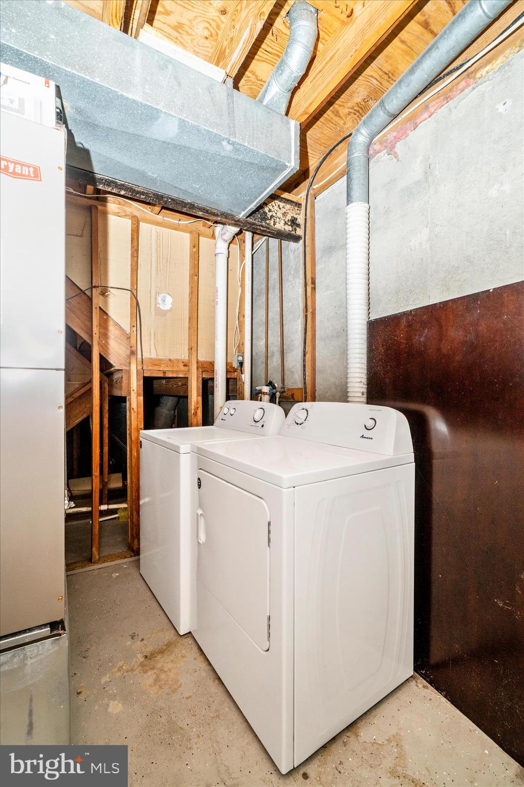 3749 Castle Terrace, Unit 12114 Silver Spring, MD 20904 - Photo 39 of 51 a utility room with dryer and washer