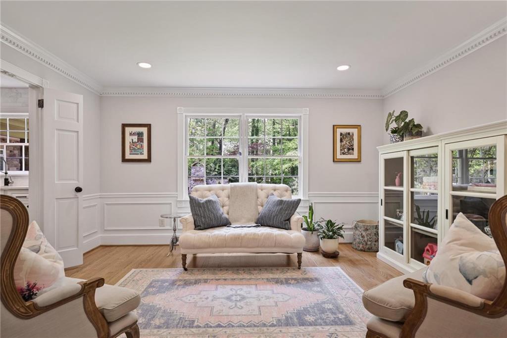 7680 Ryefield Drive Atlanta, GA 30350 - Photo 15 of 49 a living room with furniture and a large window