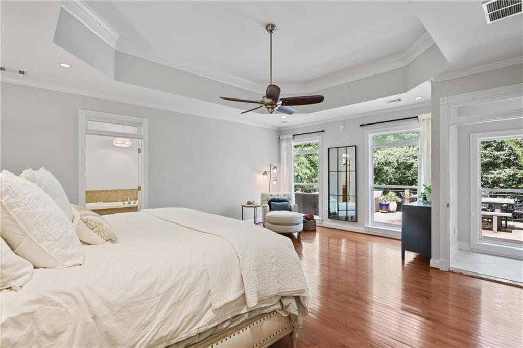 7680 Ryefield Drive Atlanta, GA 30350 - Photo 17 of 49 a bedroom with a bed window and couch
