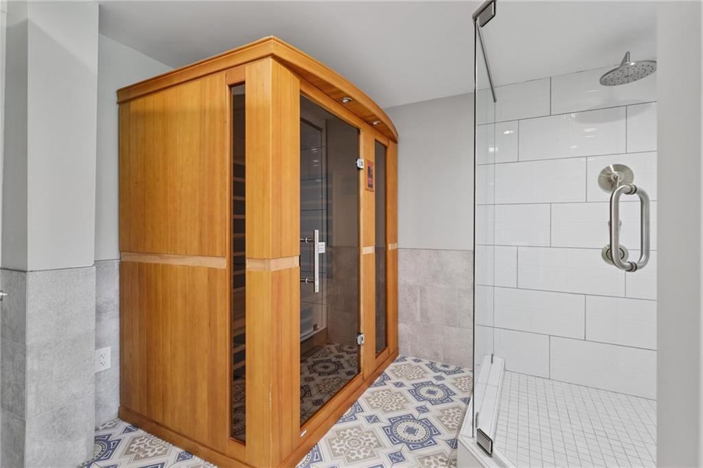 7680 Ryefield Drive Atlanta, GA 30350 - Photo 32 of 49 a bathroom with a shower