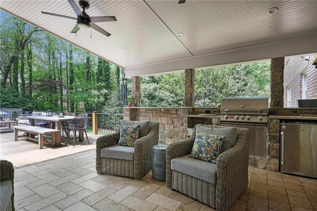 7680 Ryefield Drive Atlanta, GA 30350 - Photo 40 of 49 a living room with furniture and large windows