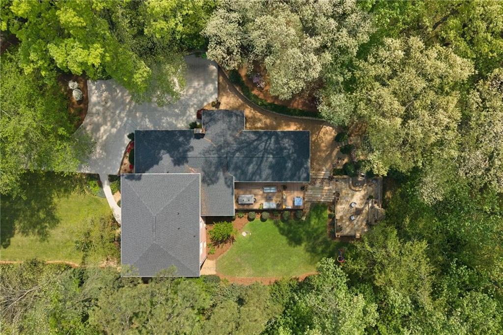 7680 Ryefield Drive Atlanta, GA 30350 - Photo 44 of 49 an aerial view of a house with swimming pool and garden