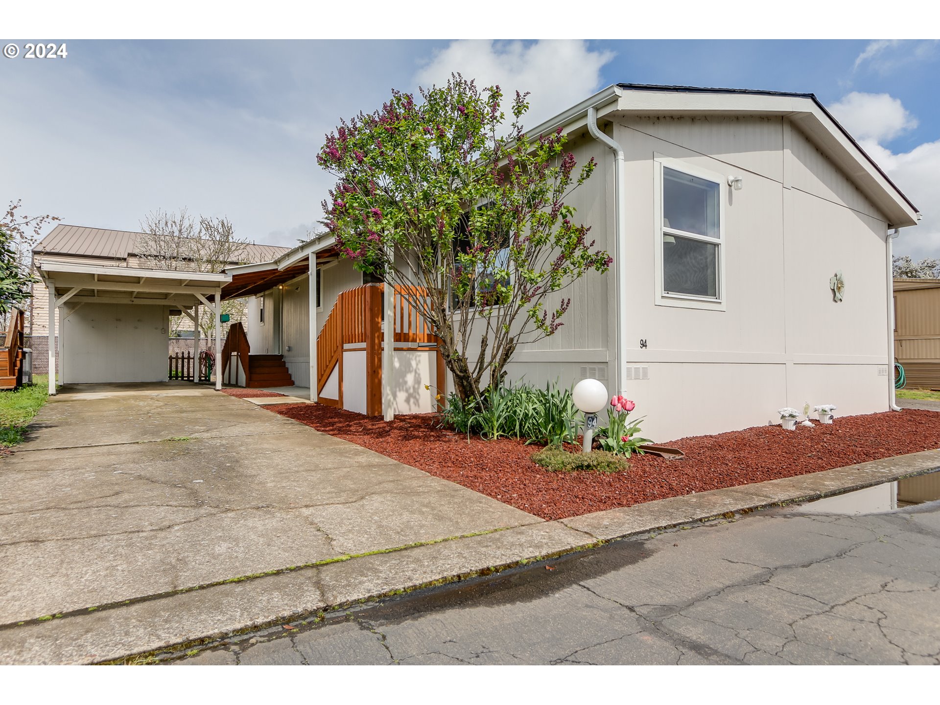 2150 Laura Street, Unit 94 Springfield, OR 97477 - Photo 1 of 28 a house view with a outdoor space