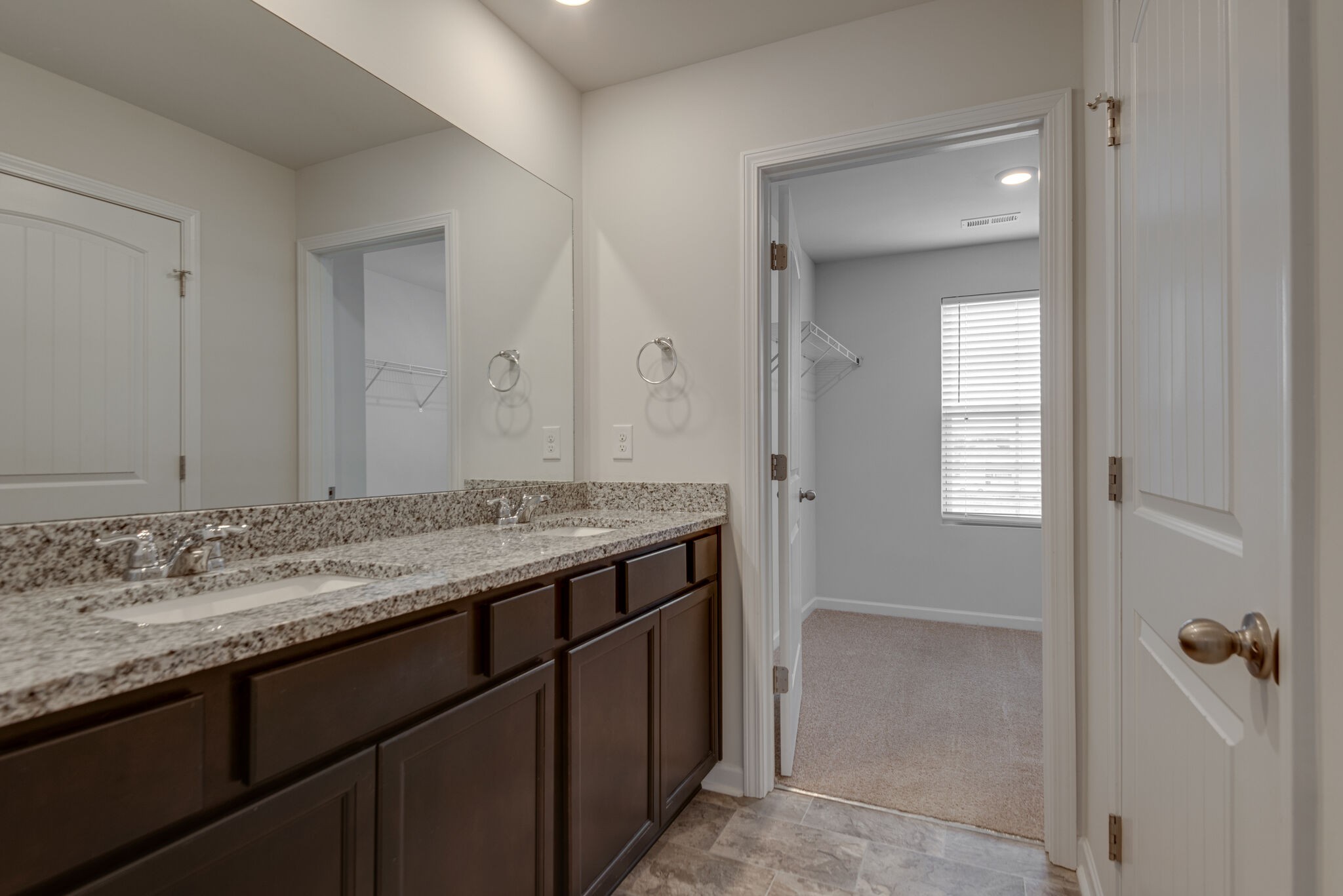 7708 Stapleton Chase Drive Antioch, TN 37013 - Photo 13 of 22 a bathroom with a granite countertop sink and a mirror