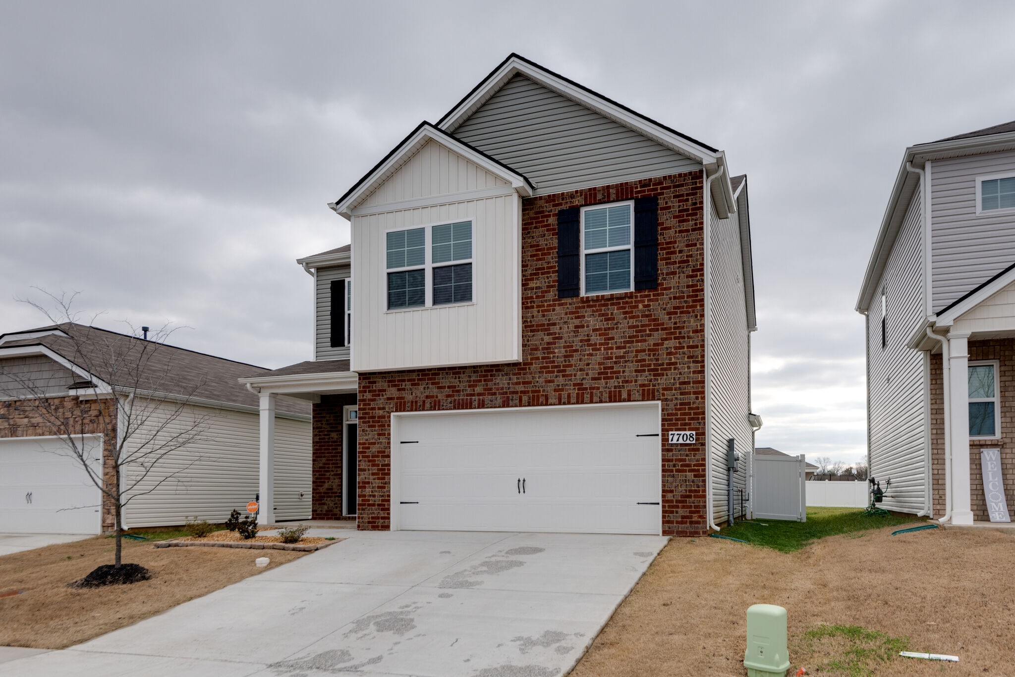 7708 Stapleton Chase Drive Antioch, TN 37013 - Photo 3 of 22 a front view of a house with garage