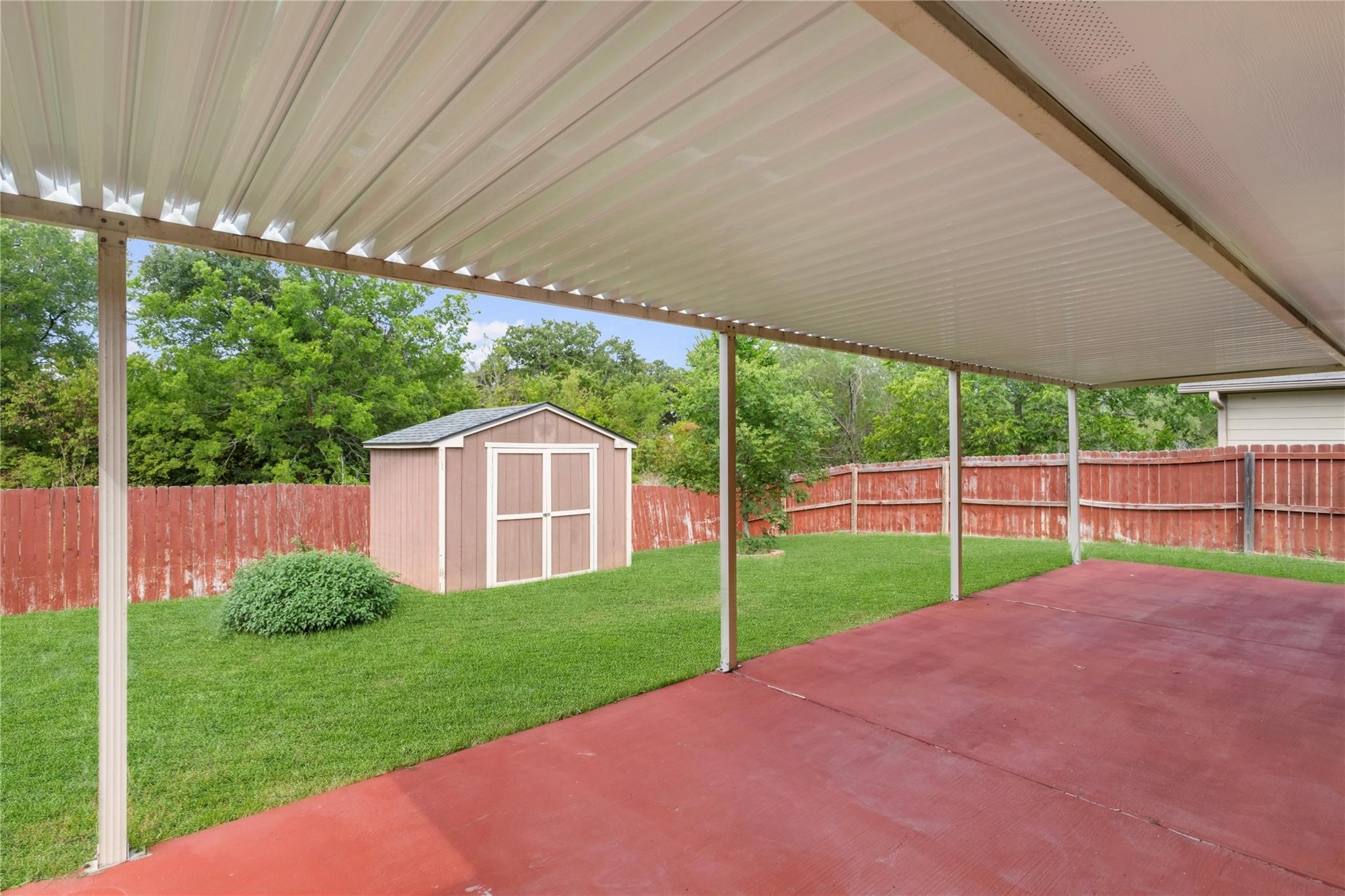 2023 Mountain Wind Loop Bryan, TX 77807 - Photo 16 of 16 a view of a backyard with green space