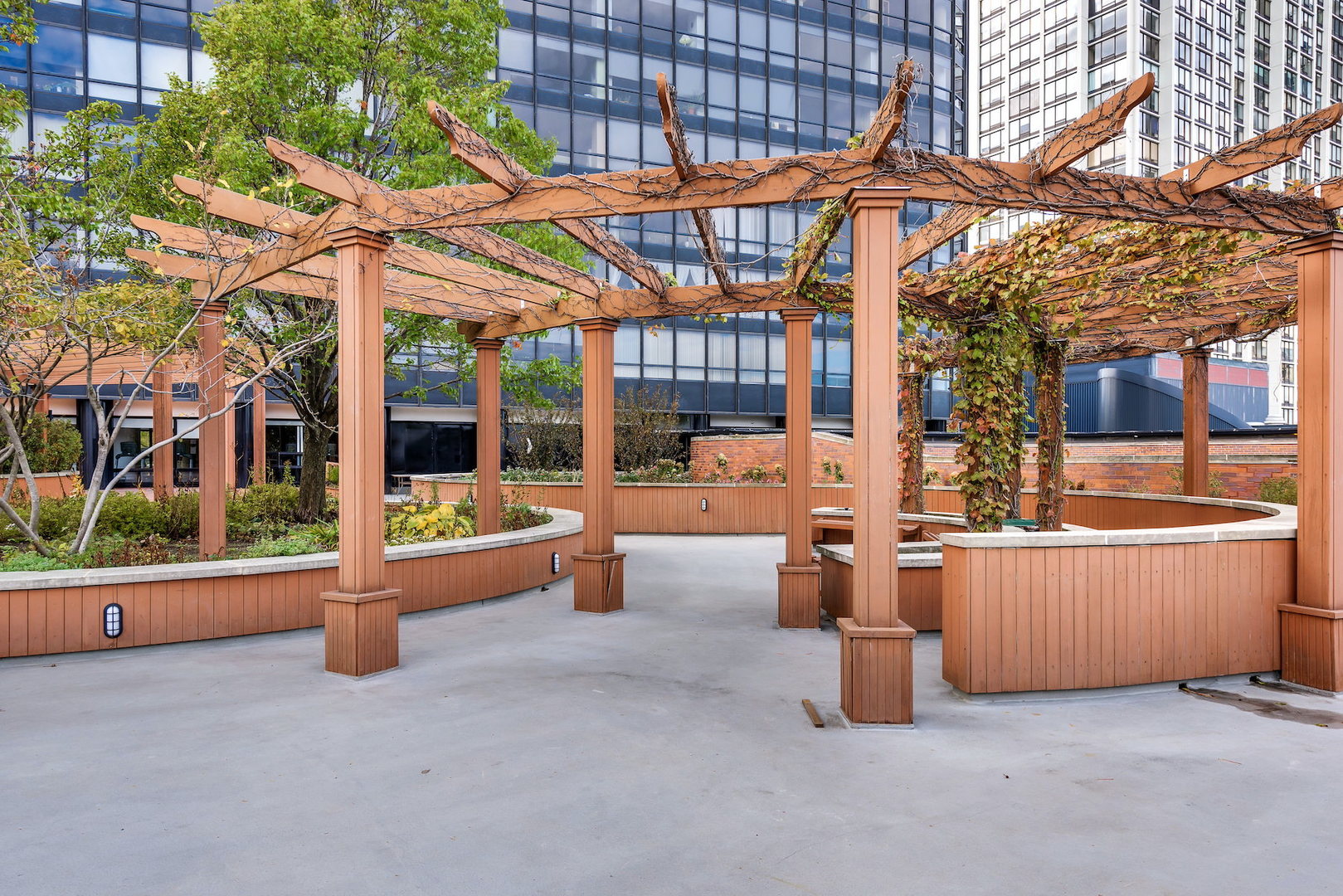 5415 North Sheridan Road, Unit 412 Chicago, IL 60640 - Photo 22 of 22 a view of a patio with a table and chairs