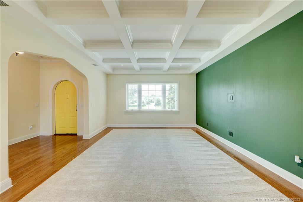 4865 Southeast Manatee Cove Road Stuart, FL 34997 - Photo 19 of 53 a view of an empty room with a window