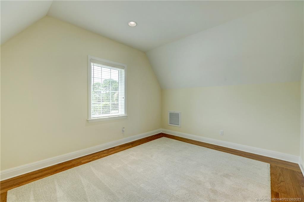 4865 Southeast Manatee Cove Road Stuart, FL 34997 - Photo 43 of 53 an empty room with a window
