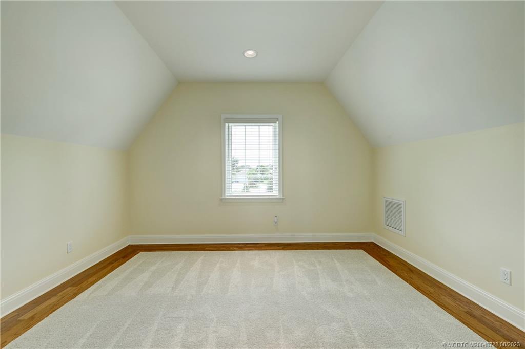 4865 Southeast Manatee Cove Road Stuart, FL 34997 - Photo 47 of 53 an empty room with a window