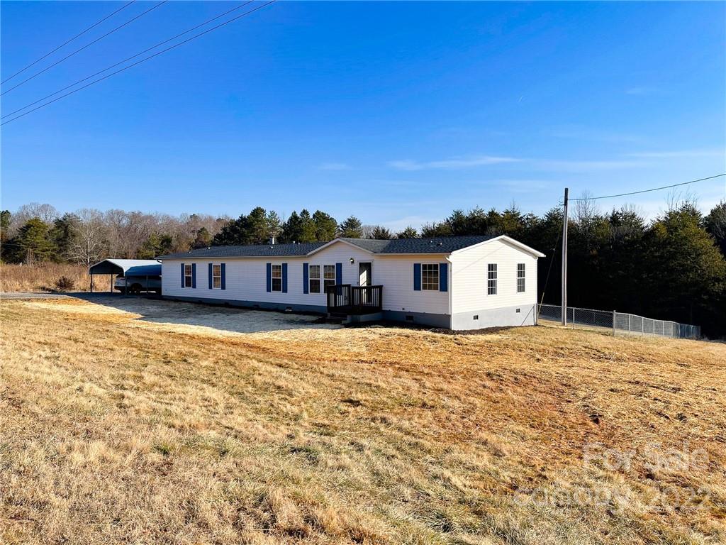 872 Harris Bridge Road, Unit 1 & 2 Stony Point, NC 28678 - Photo 2 of 31 a view of a house with a yard