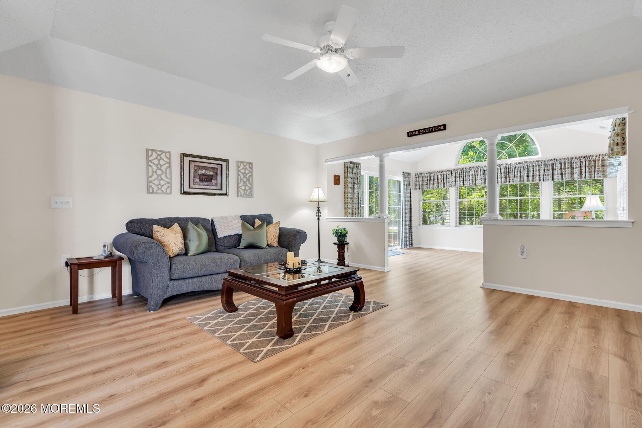 10 Congressional Road Jackson, NJ 08527 - Photo 27 of 72 a living room with furniture and a wooden floor